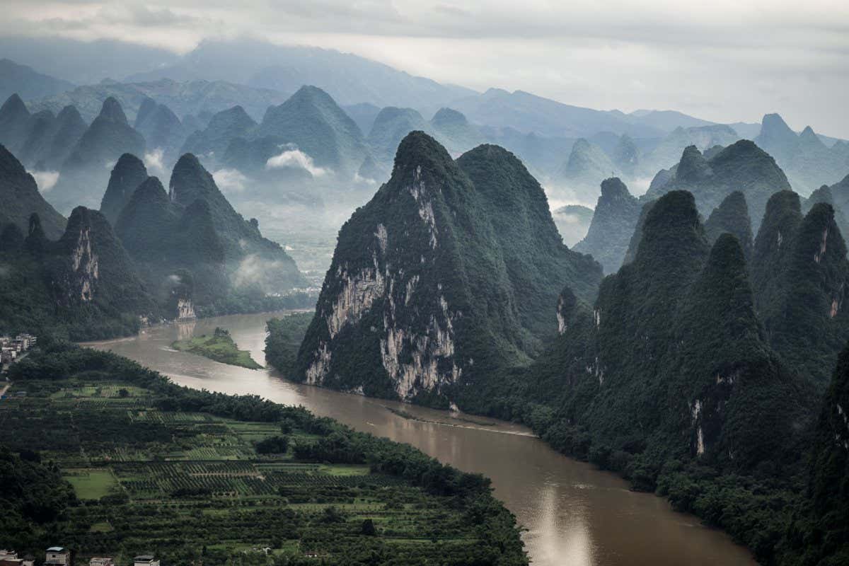 An aerial shot of Li River and Mashan Mountain in Yangshuo County, Guilin