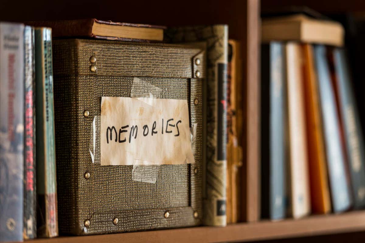 A memory box on a bookshelf